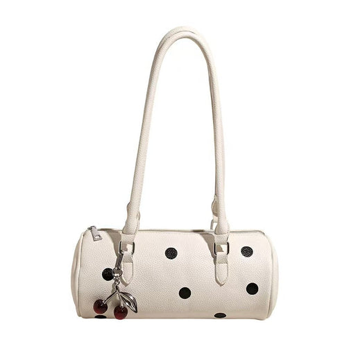 cylindrical women's bag with pendant – fashion trend, | dropsona - neutral - material texture