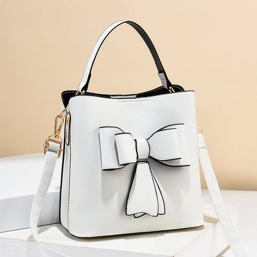 classic bucket bow women's crossbody bag - large capac | dropsona - neutral - front view