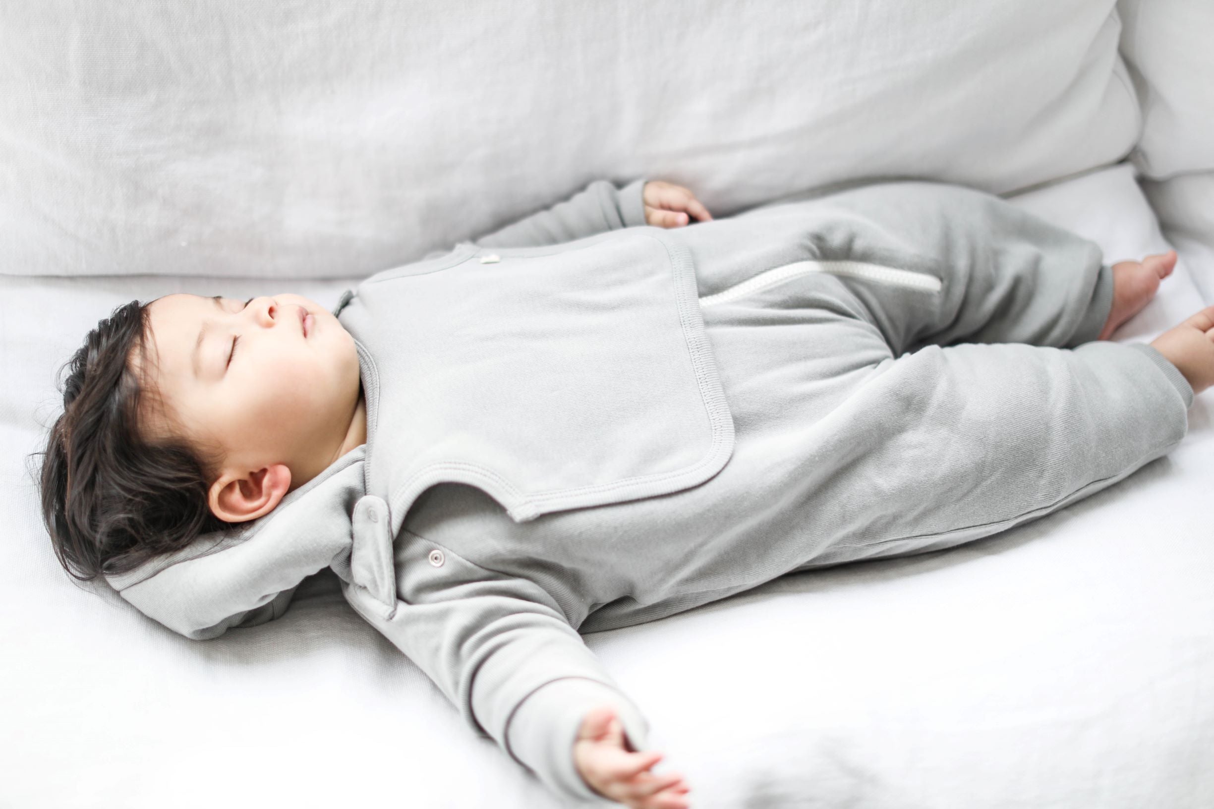 smart cuddly jumpsuit + bib - gray – super soft and co | dropsona - neutral - usage example