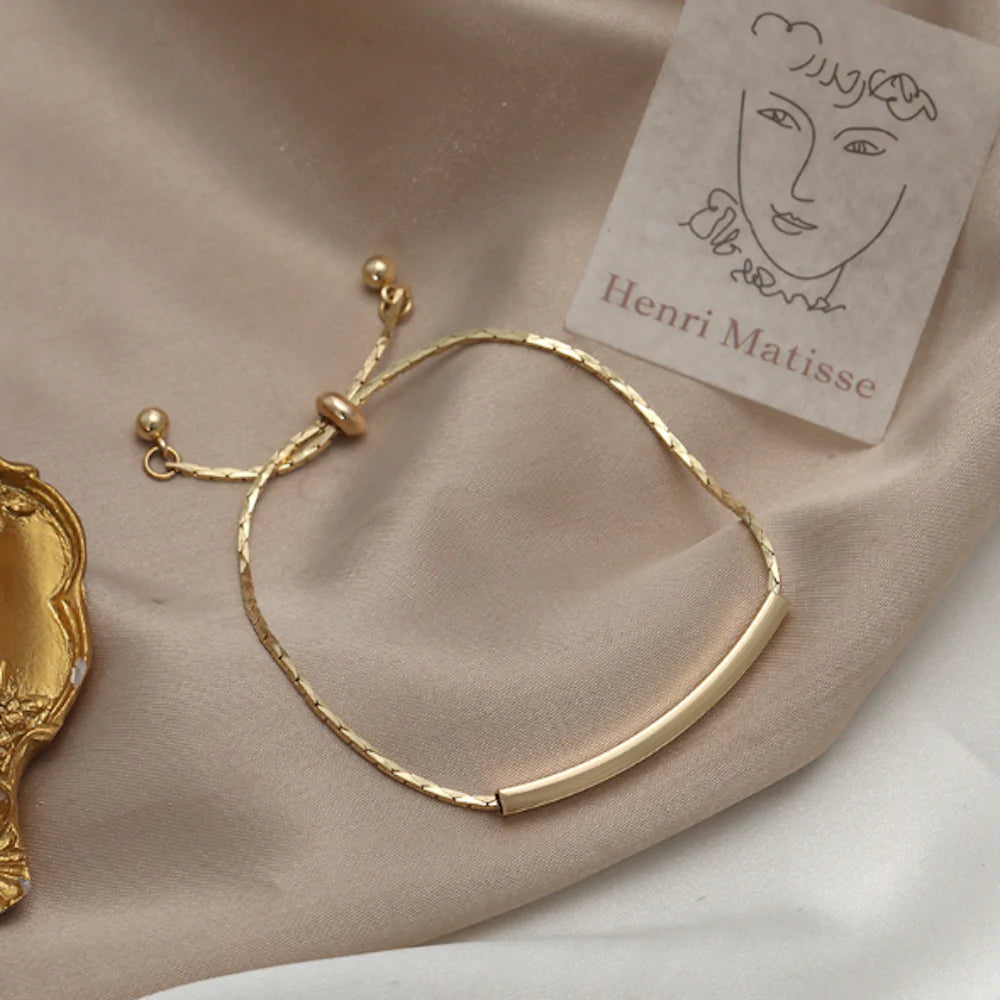 womens knot style bracelet with a bar – the length of | dropsona - neutral - front view
