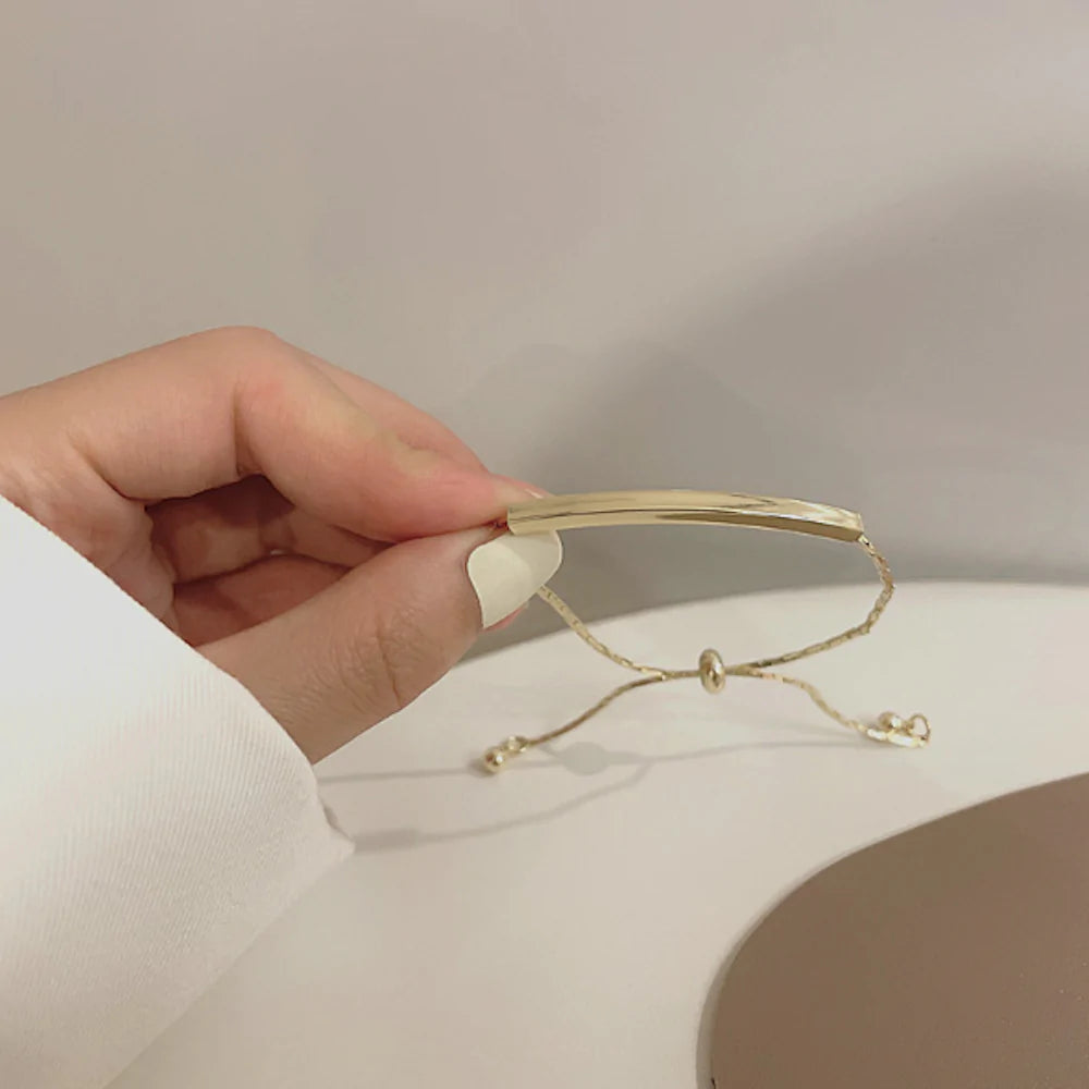 womens knot style bracelet with a bar – the length of | dropsona - neutral - material texture