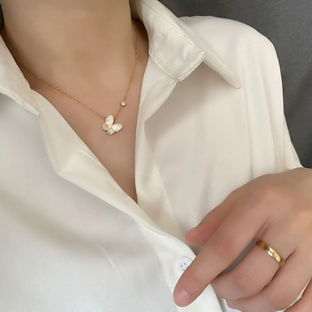 womens necklace with butterfly pedant – this ne | dropsona - neutral - close-up detail