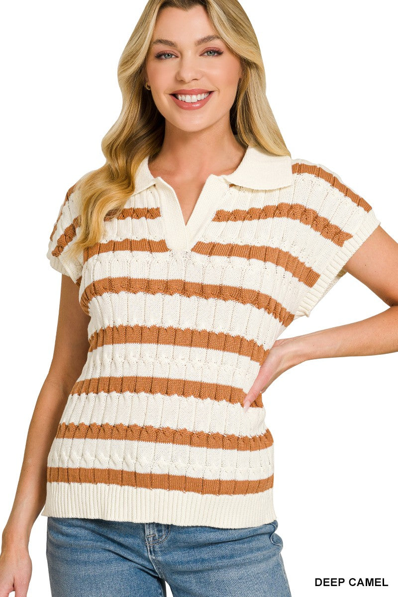 Collection of six different sweater styles laid out showing various textures and designs