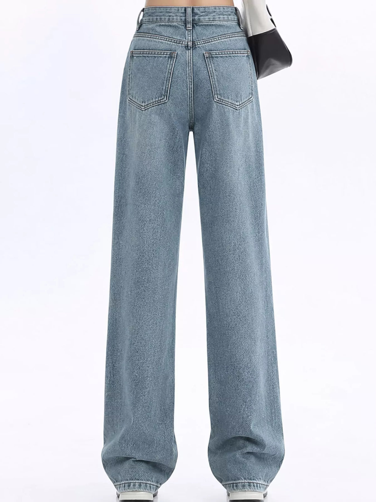 high-waisted vintage wash wide-leg jeans | dropsona - neutral - close-up detail