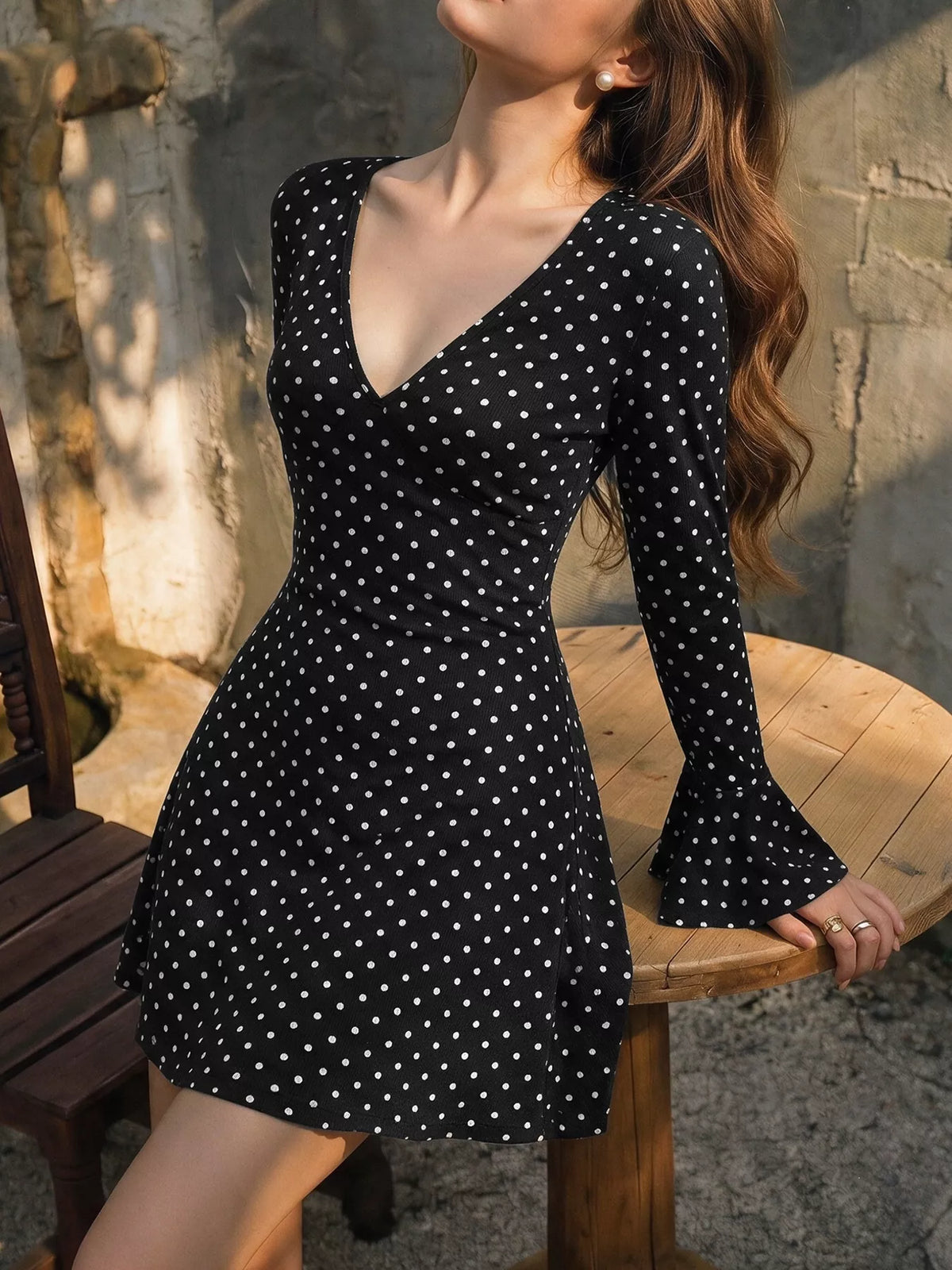 polka dot long sleeve ruffle hem mini dress | dropsona - neutral - close-up detail