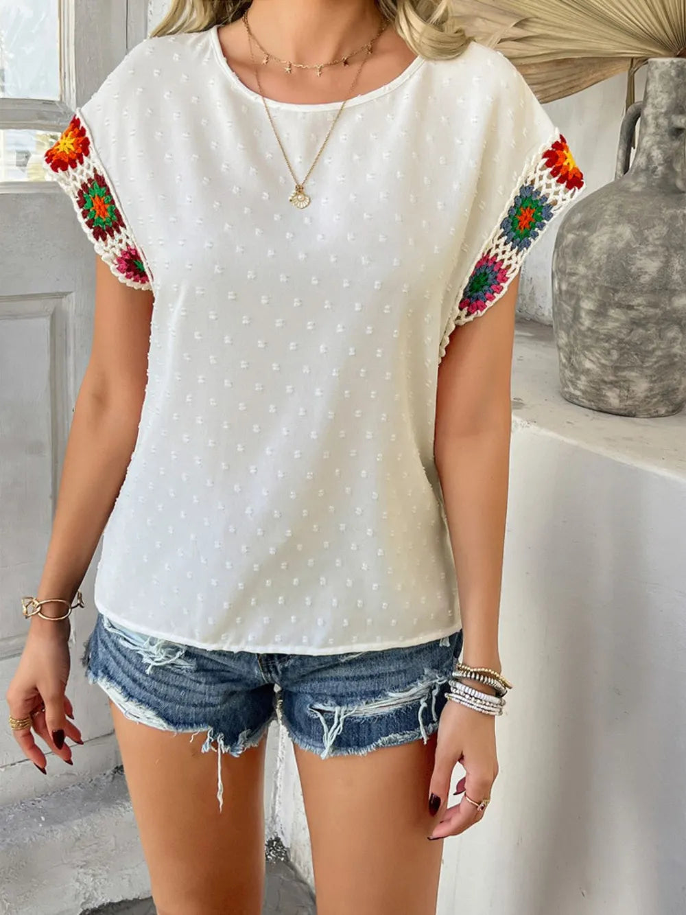 devine swiss dot round neck crochet short sleeve top - material texture