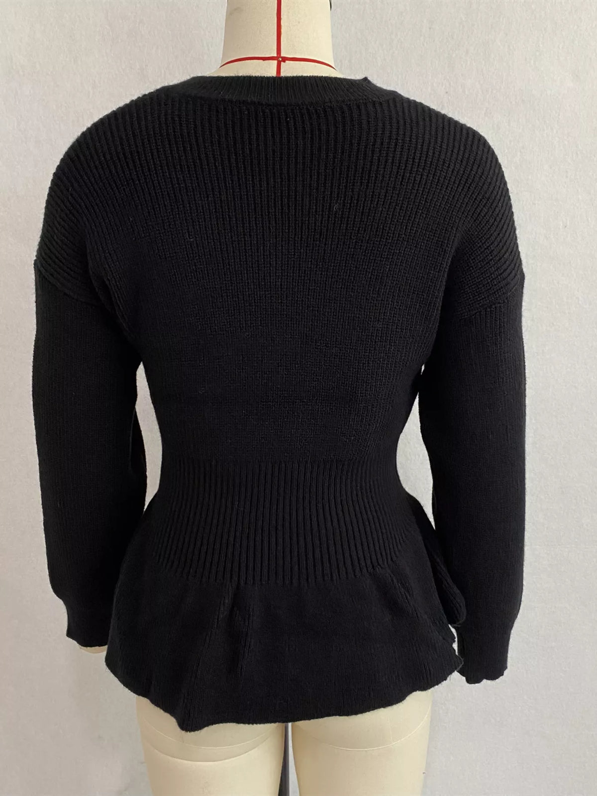 v-neck peplum hem ribbed knit top – | dropsona - neutral - close-up detail