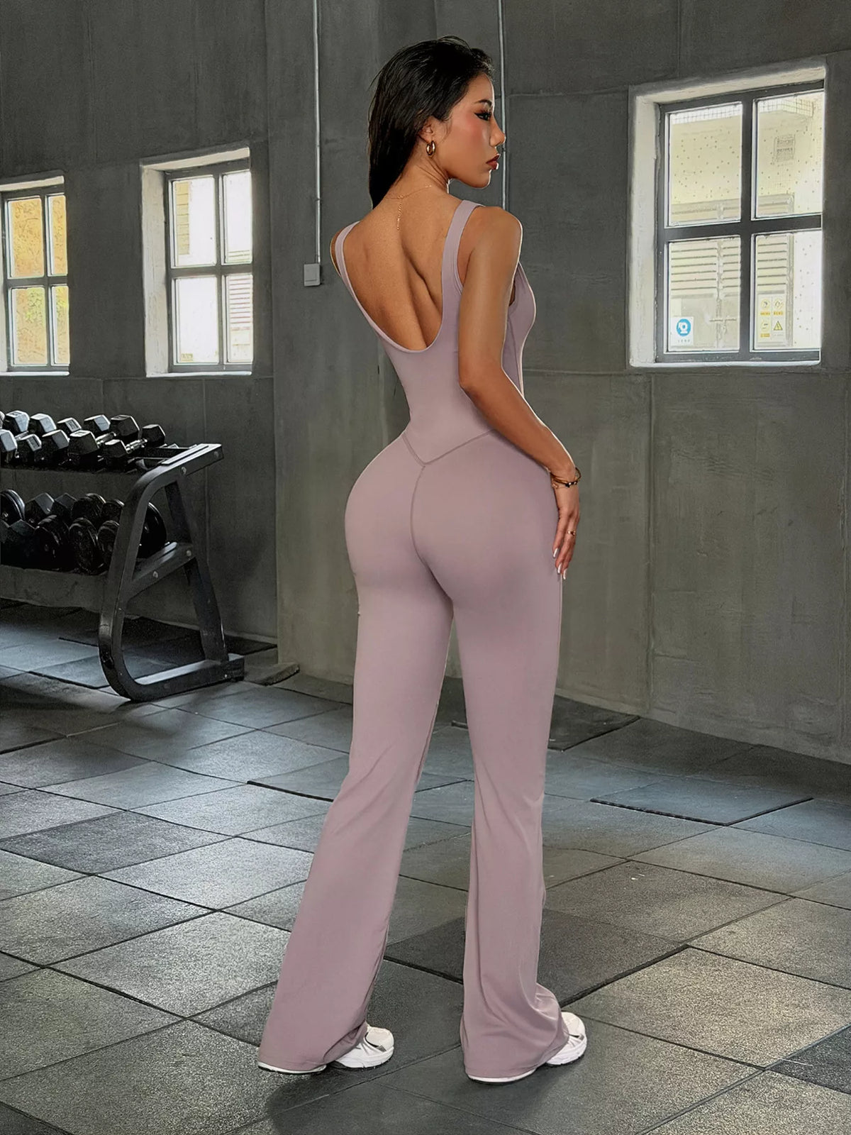 sleeveless active jumpsuit with flared leg design | dropsona - neutral - size reference