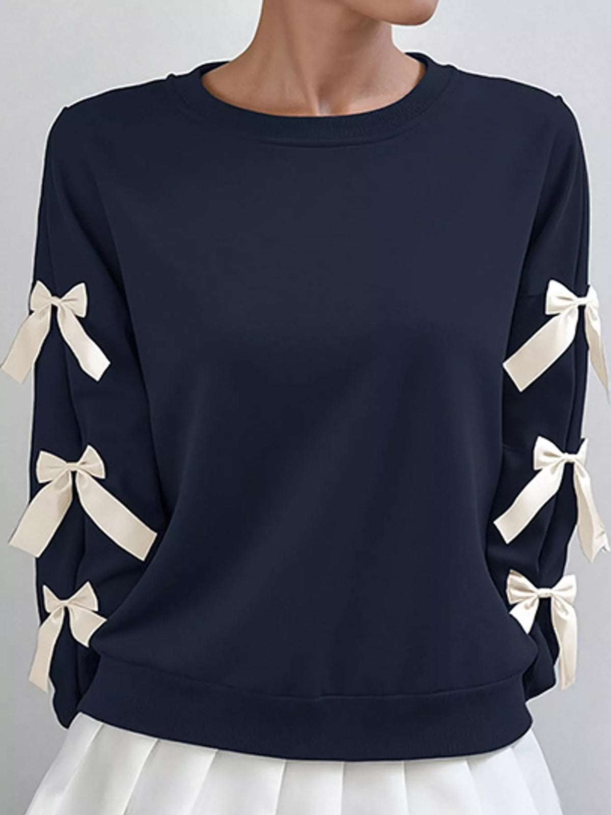 crew neck sweatshirt with decorative bow | dropsona - neutral - front view