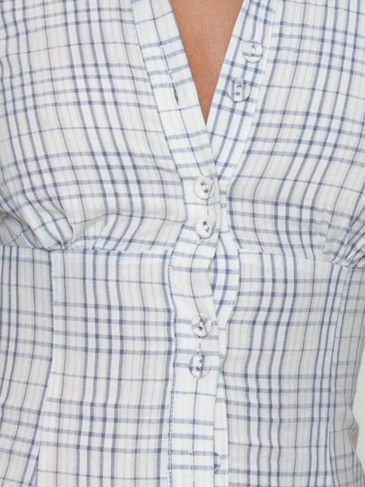 plaid short sleeve button-up shirt - close-up detail