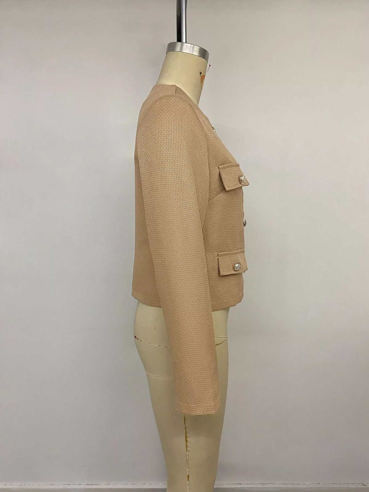 textured cropped jacket with gold-tone button | dropsona - neutral - close-up detail