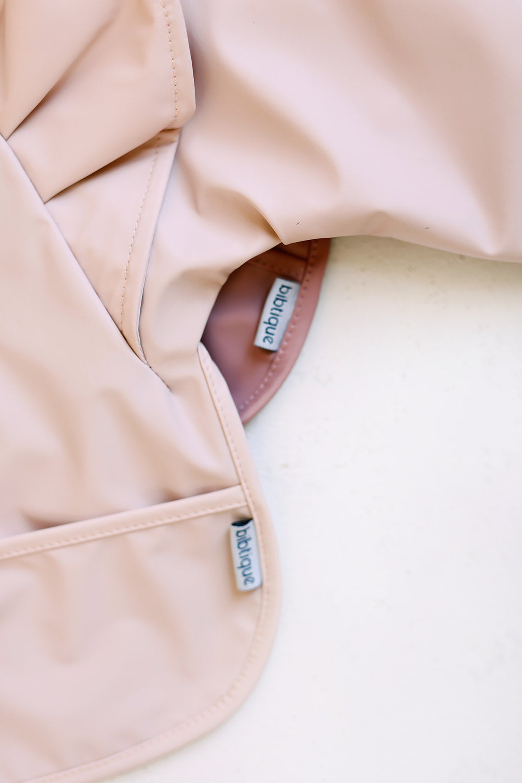 peony long sleeve ruffle angel bib – certified baby sa | dropsona - neutral - close-up detail