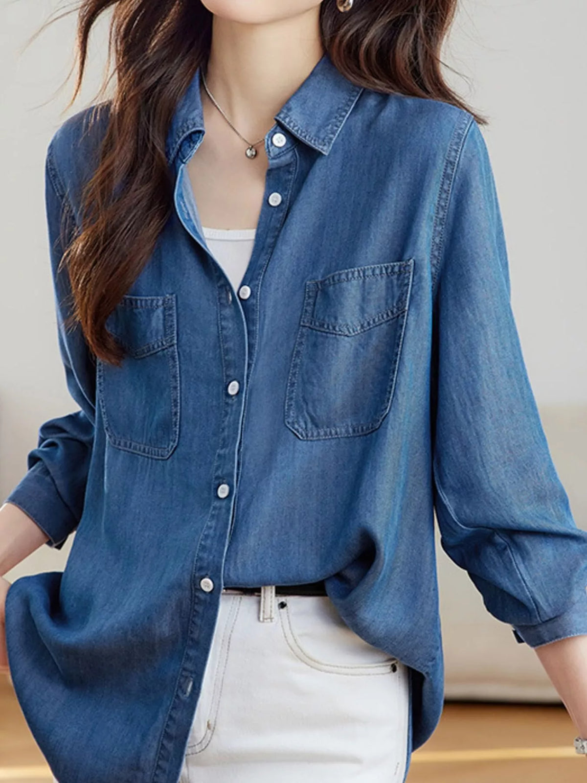 button-down denim shirt with dual chest pockets | dropsona - neutral - close-up detail