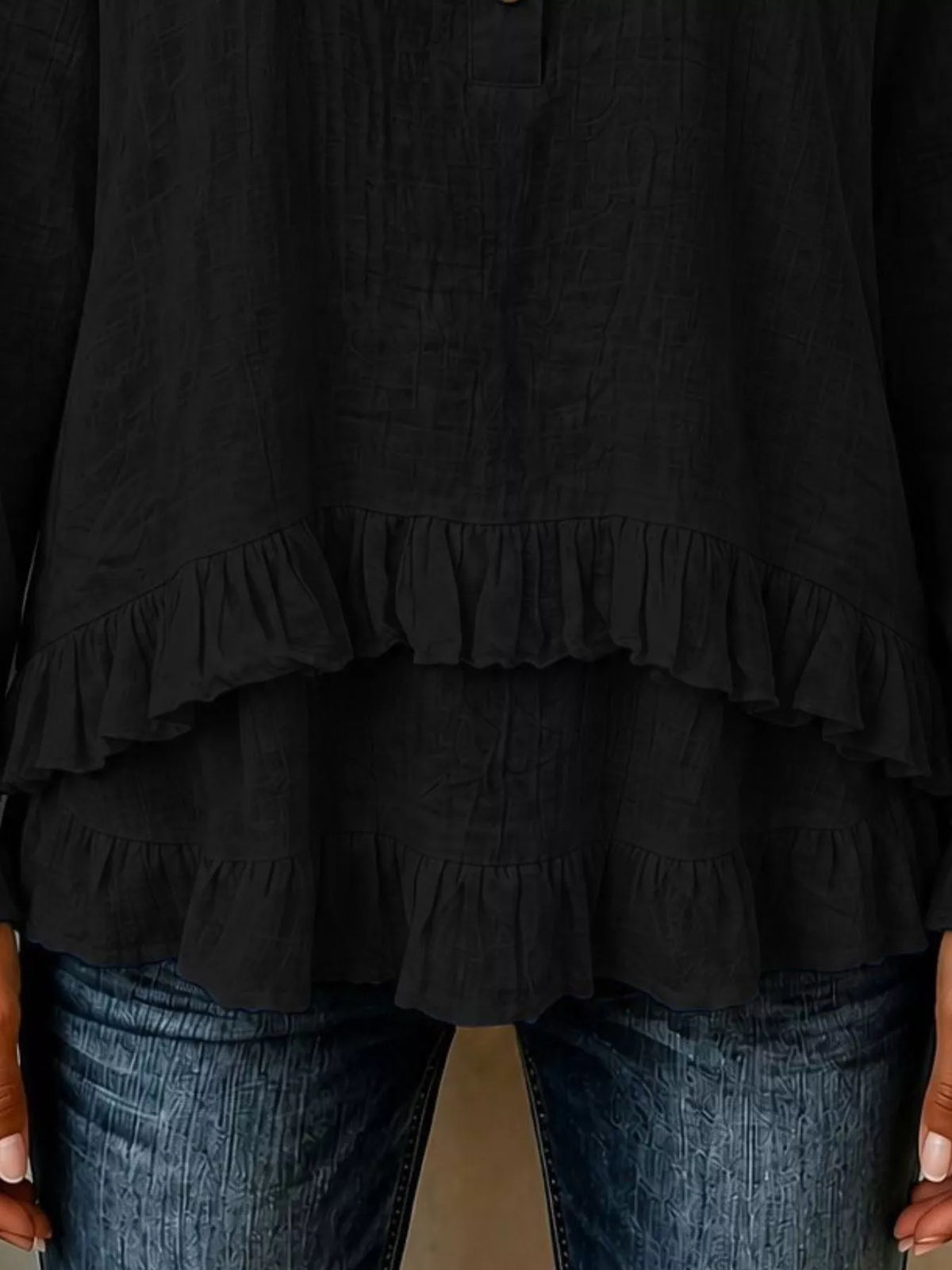 v-neck long sleeve button detail ruffled hem blouse | dropsona - neutral - close-up detail