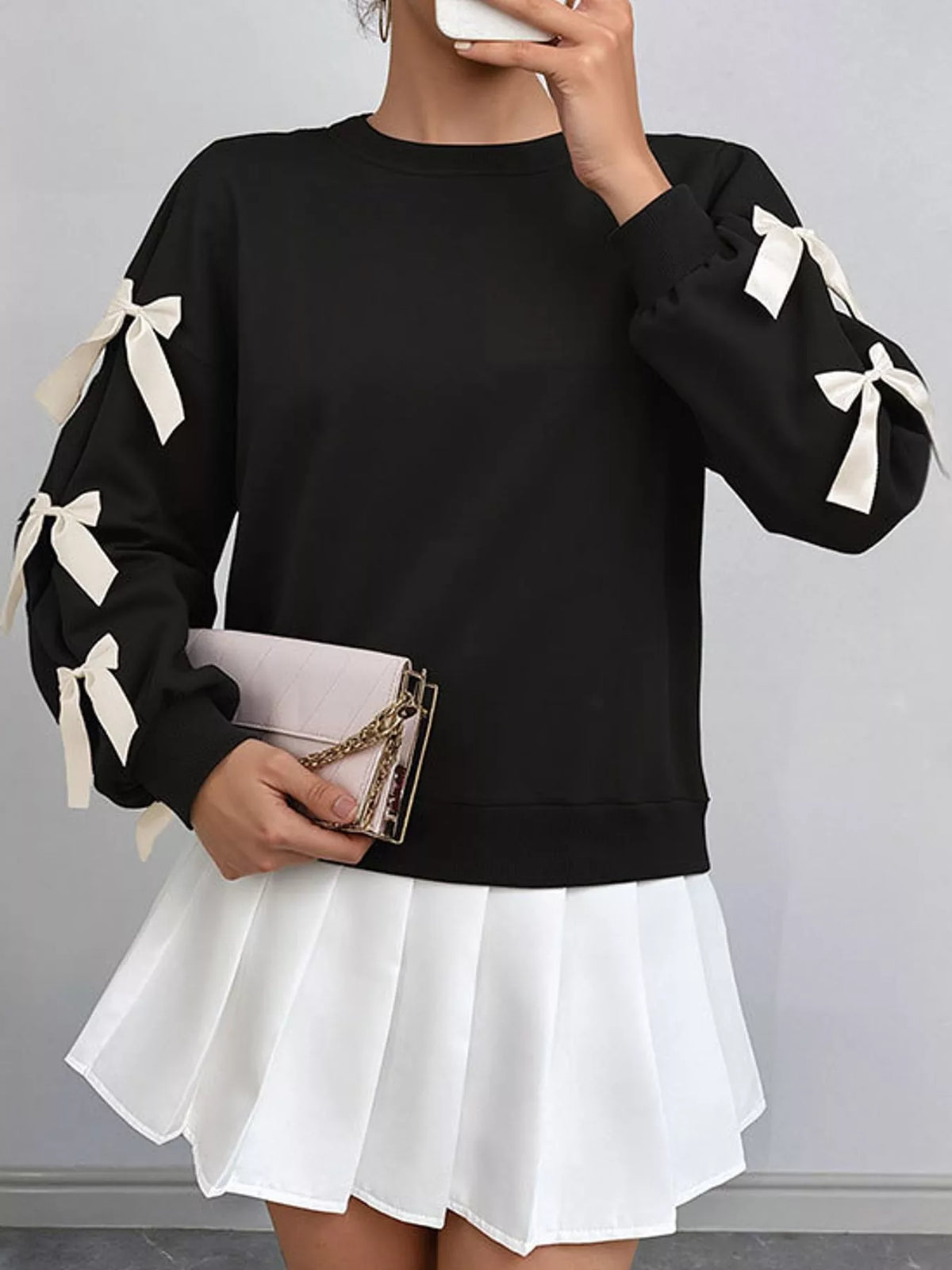 crew neck sweatshirt with decorative bow | dropsona - neutral - close-up detail