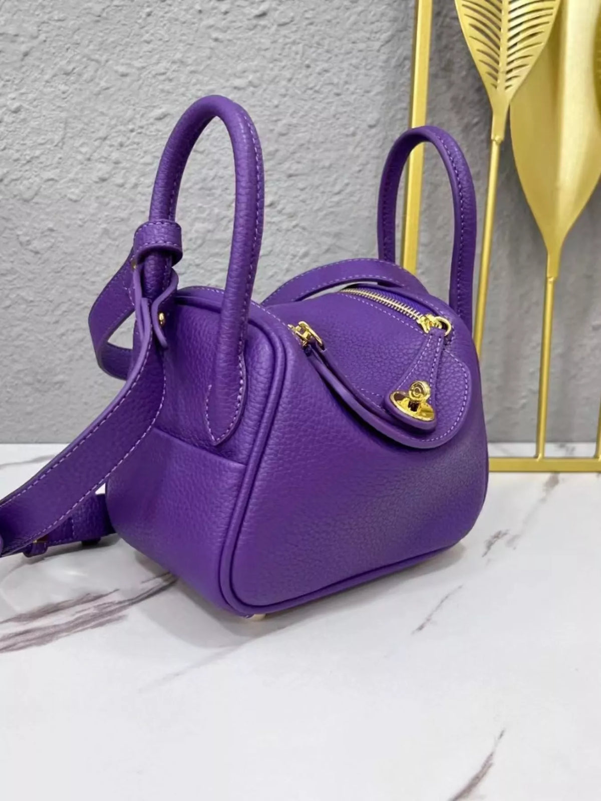 gold-tone hardware leather crossbody bag | dropsona - neutral - usage example