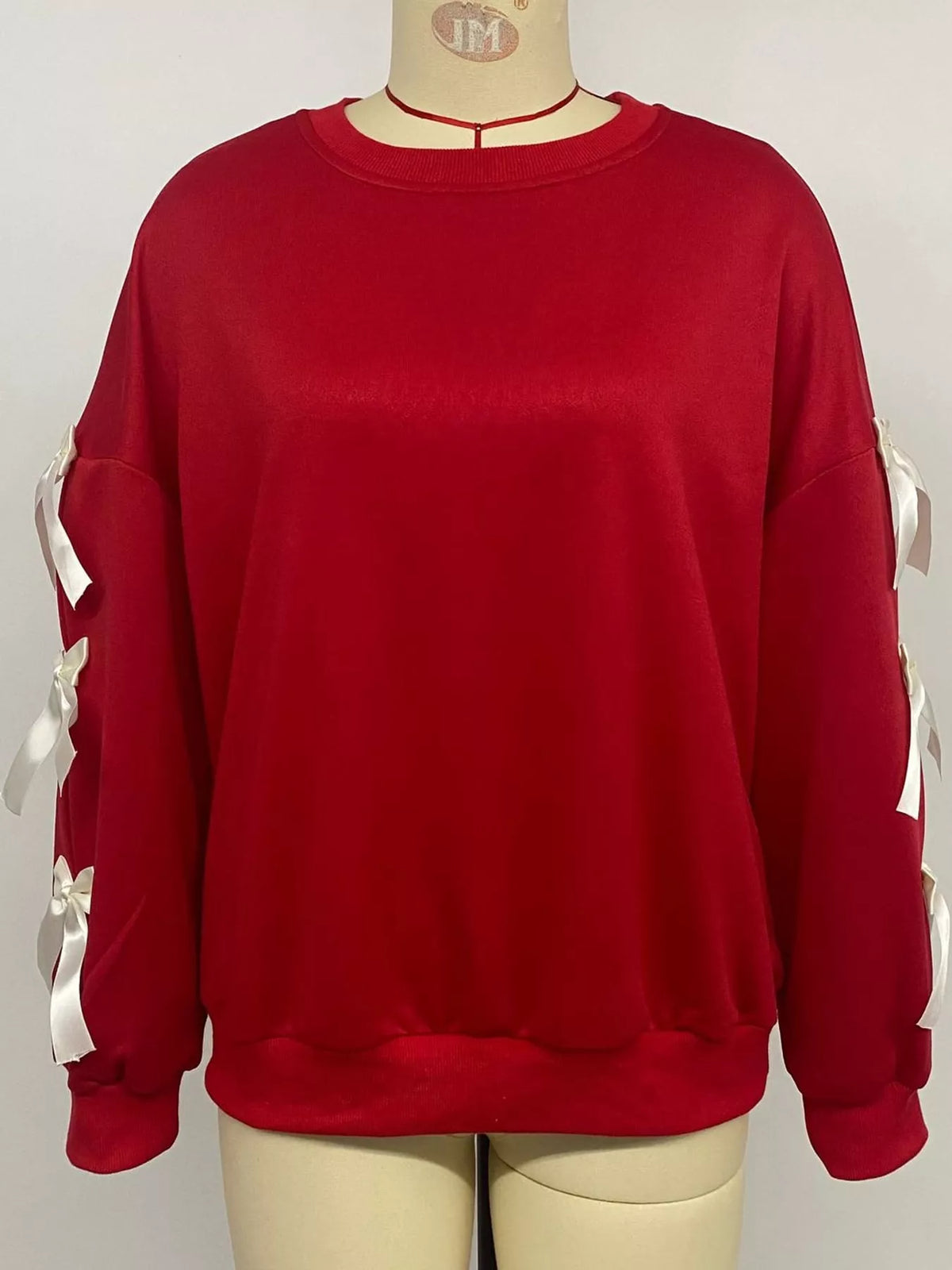 crew neck sweatshirt with decorative bow | dropsona - neutral - packaging
