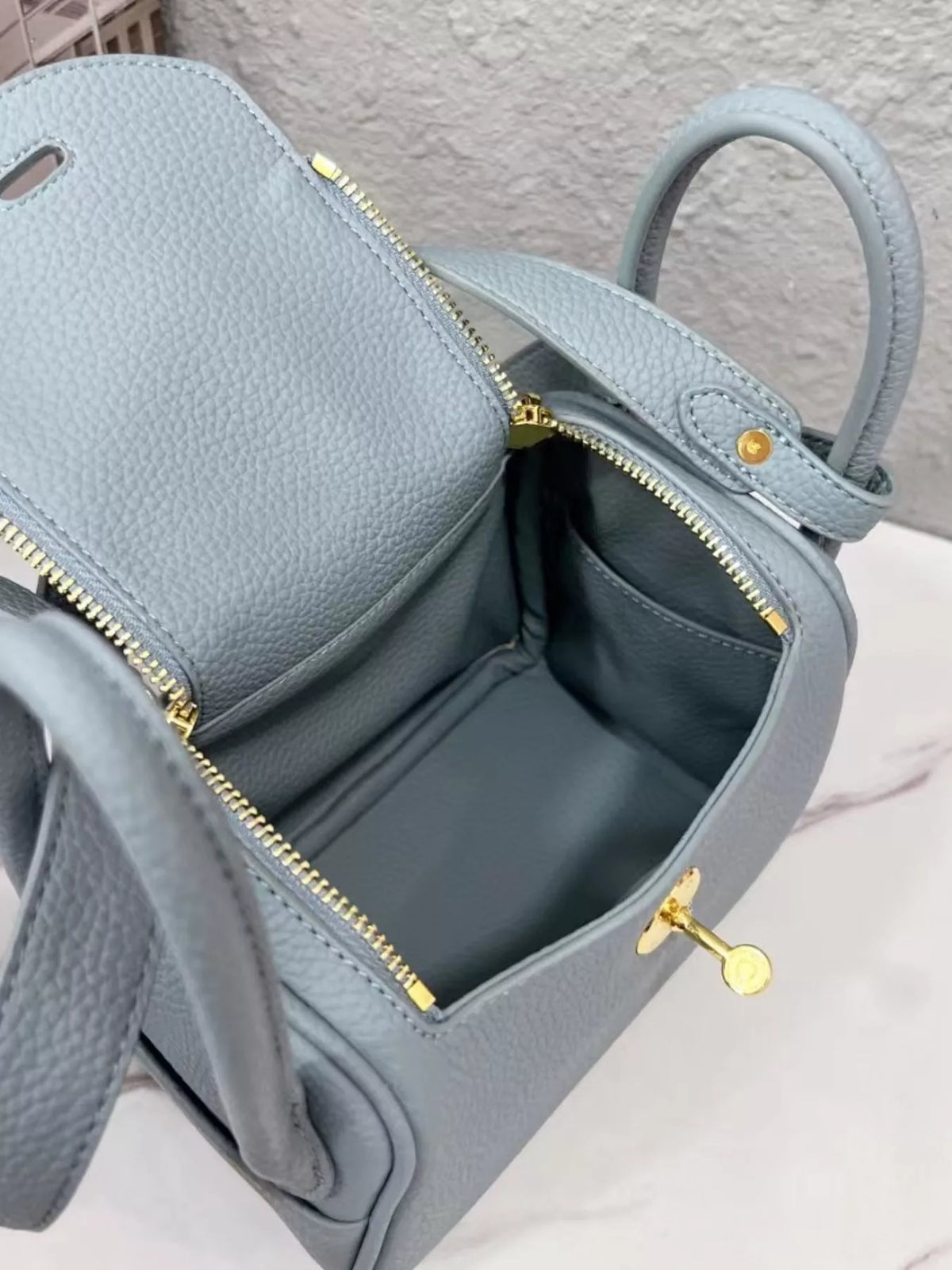 gold-tone hardware leather crossbody bag | dropsona - neutral - front view