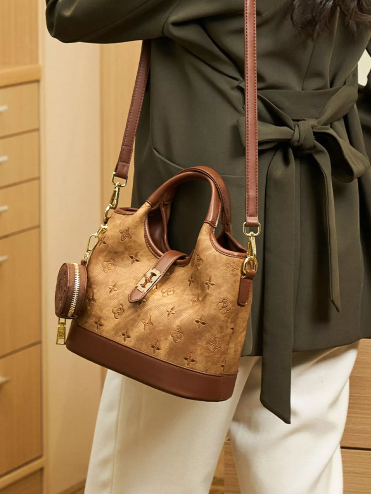 embossed crossbody bag with detachable coin pouch | dropsona - neutral - close-up detail