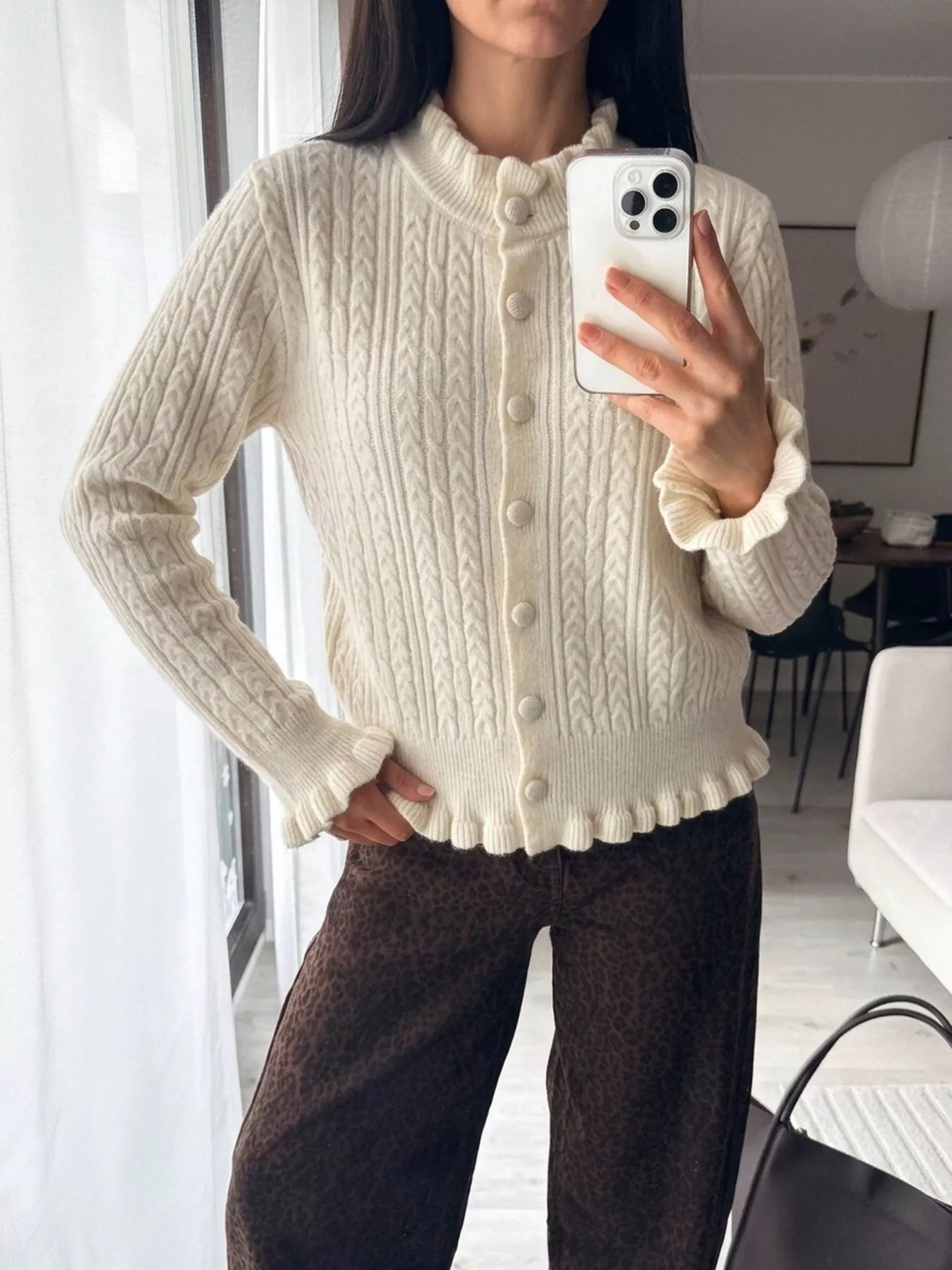 cable-knit ruffle-trim cardigan | dropsona - neutral - close-up detail