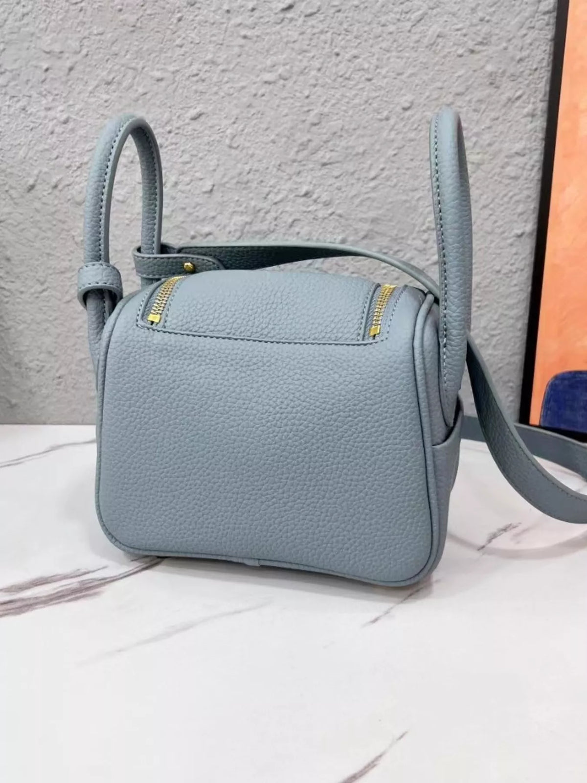 gold-tone hardware leather crossbody bag | dropsona - neutral - usage example