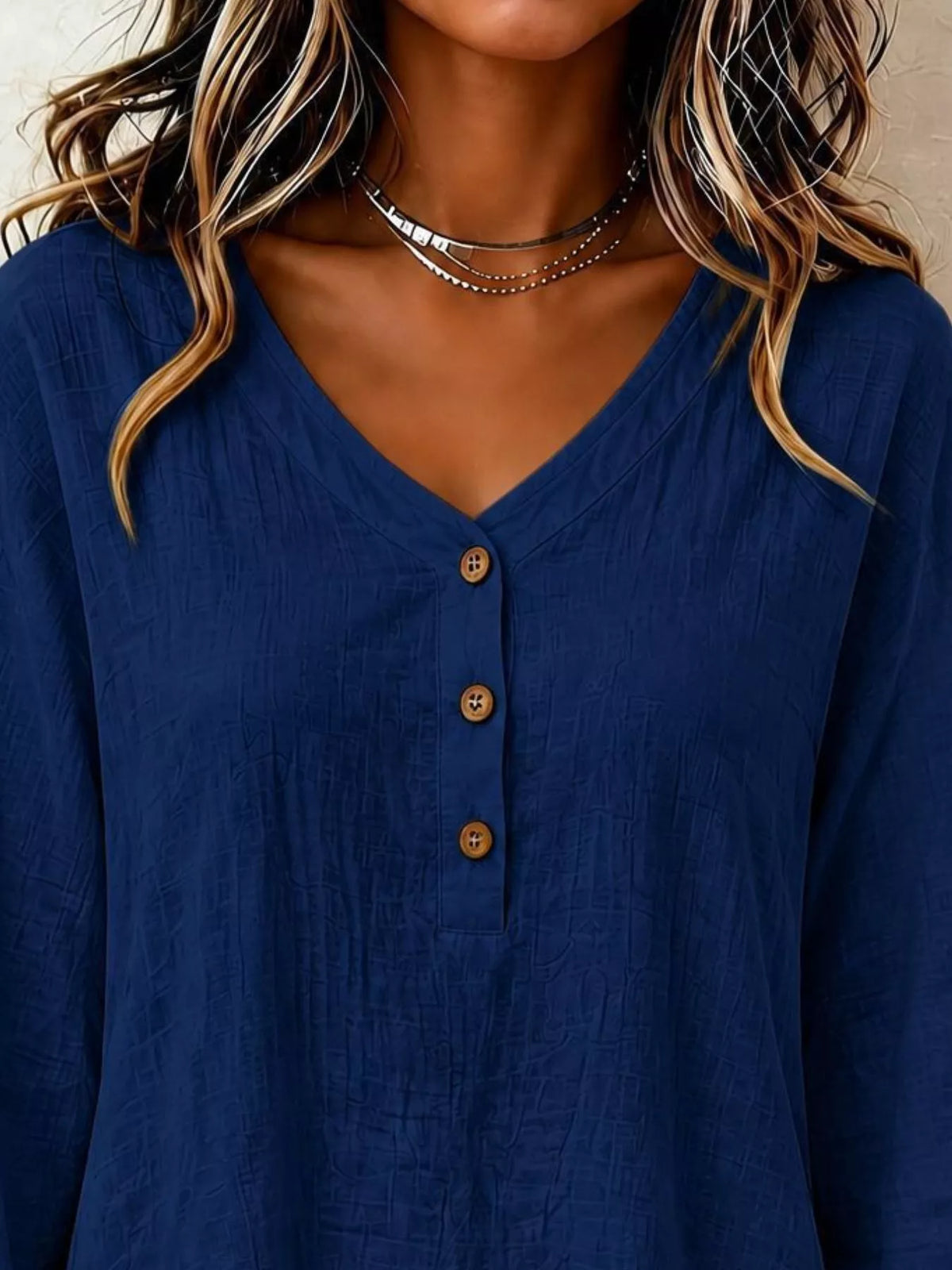 v-neck long sleeve button detail ruffled hem blouse | dropsona - neutral - size reference
