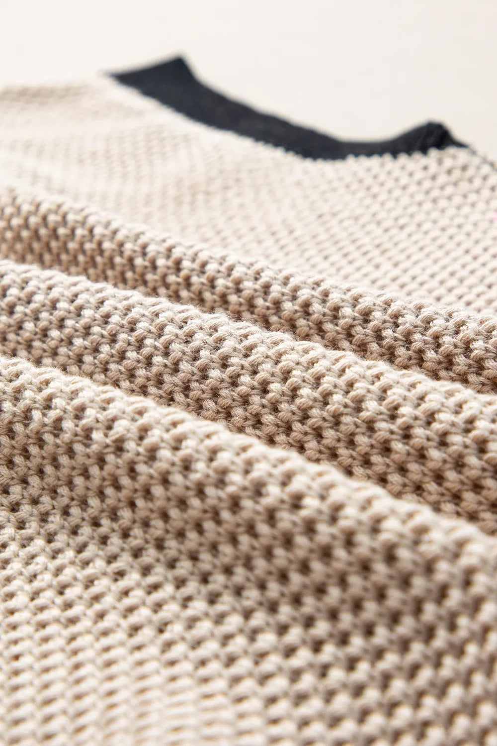 textured knit sweater with contrast trim details | dropsona - neutral - close-up detail