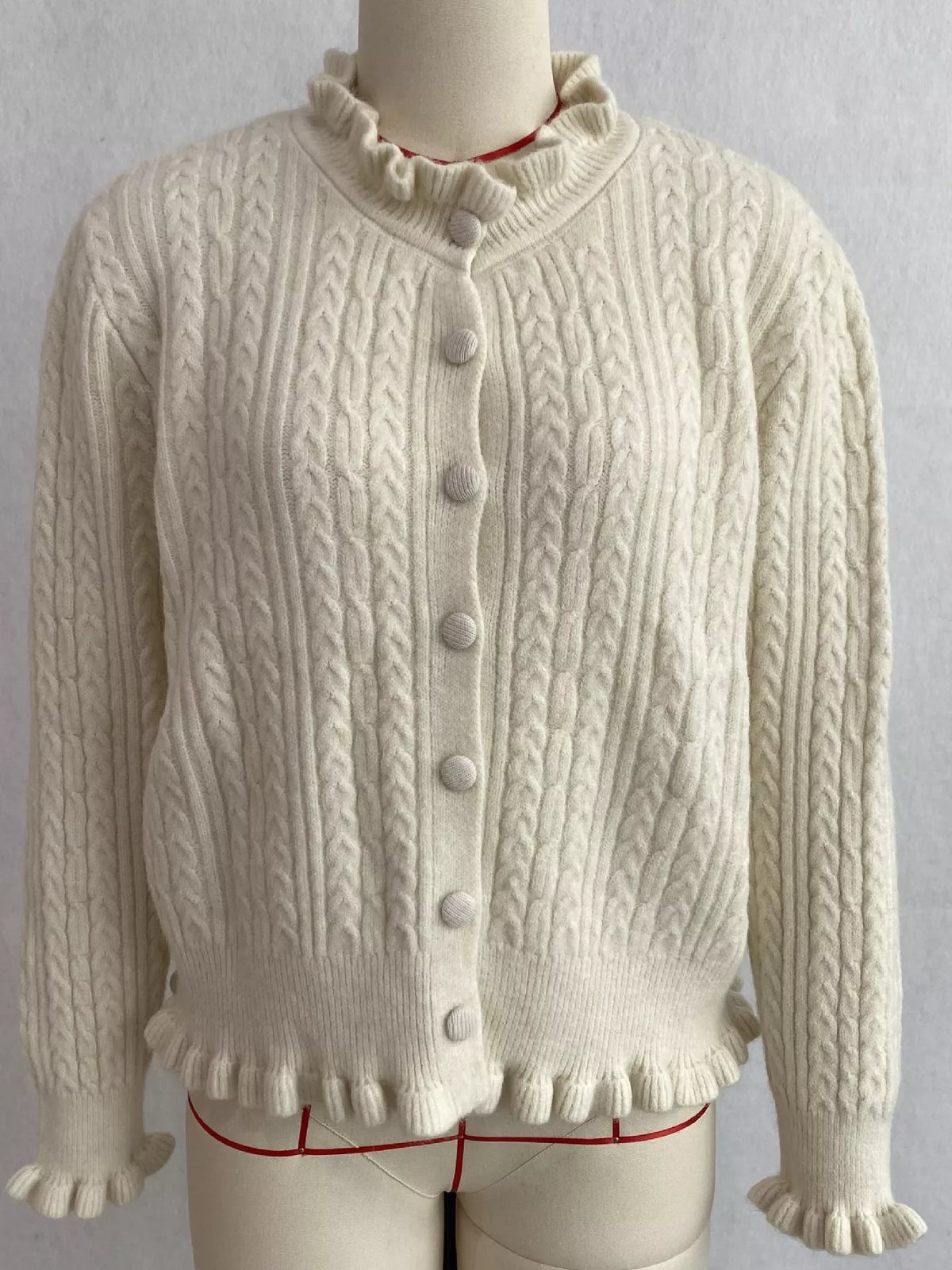 cable-knit ruffle-trim cardigan | dropsona - neutral - size reference