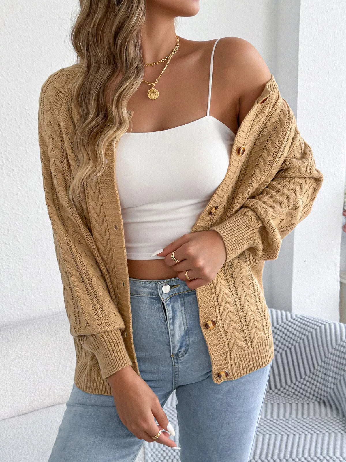 cable knit button-front cardigan – cable-knit,buttoned | dropsona - neutral - close-up detail