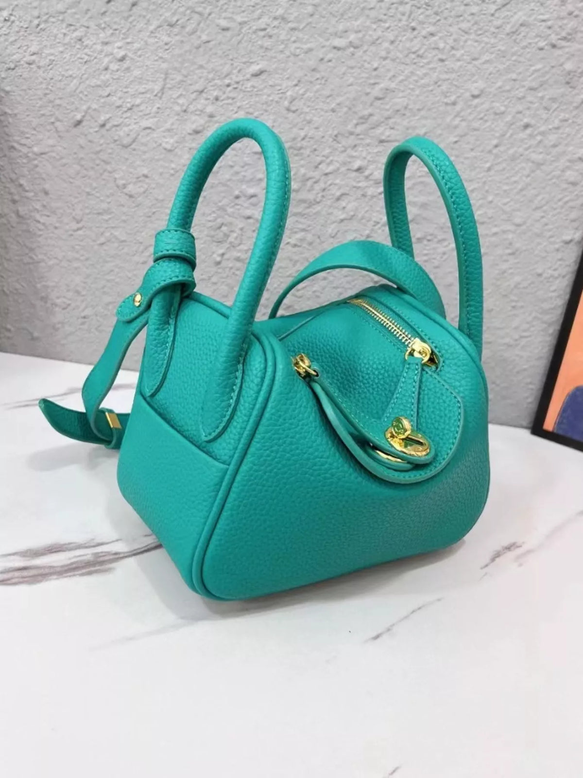 gold-tone hardware leather crossbody bag | dropsona - neutral - usage example