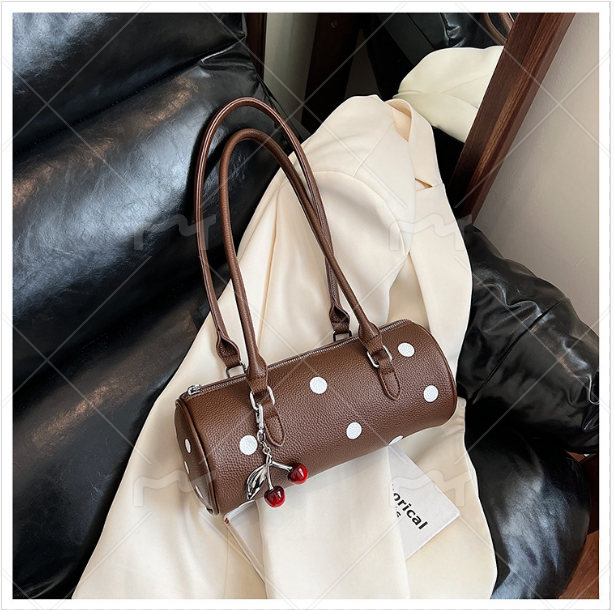 cylindrical women's bag with pendant – fashion trend, | dropsona - neutral - front view