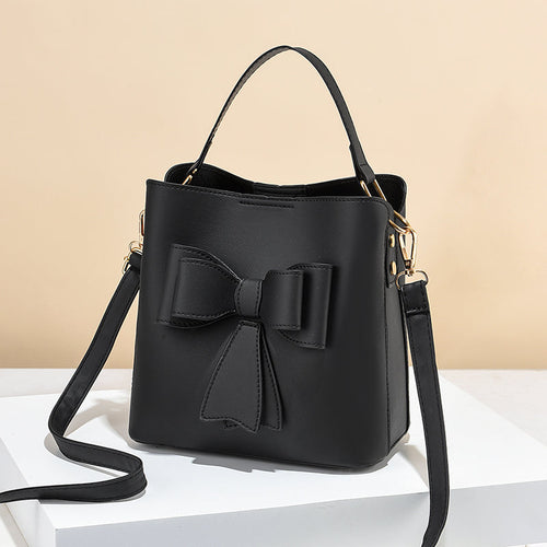 classic bucket bow women's crossbody bag - large capac | dropsona - neutral - material texture