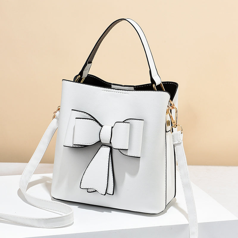 classic bucket bow women's crossbody bag - large capac | dropsona - neutral - packaging