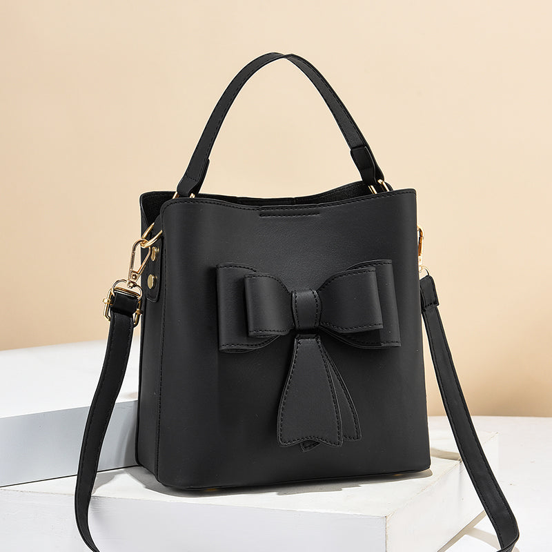 classic bucket bow women's crossbody bag - large capac | dropsona - neutral - close-up detail