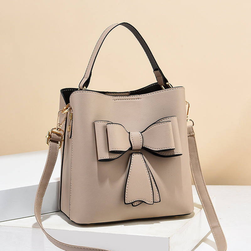 classic bucket bow women's crossbody bag - large capac | dropsona - neutral - size reference