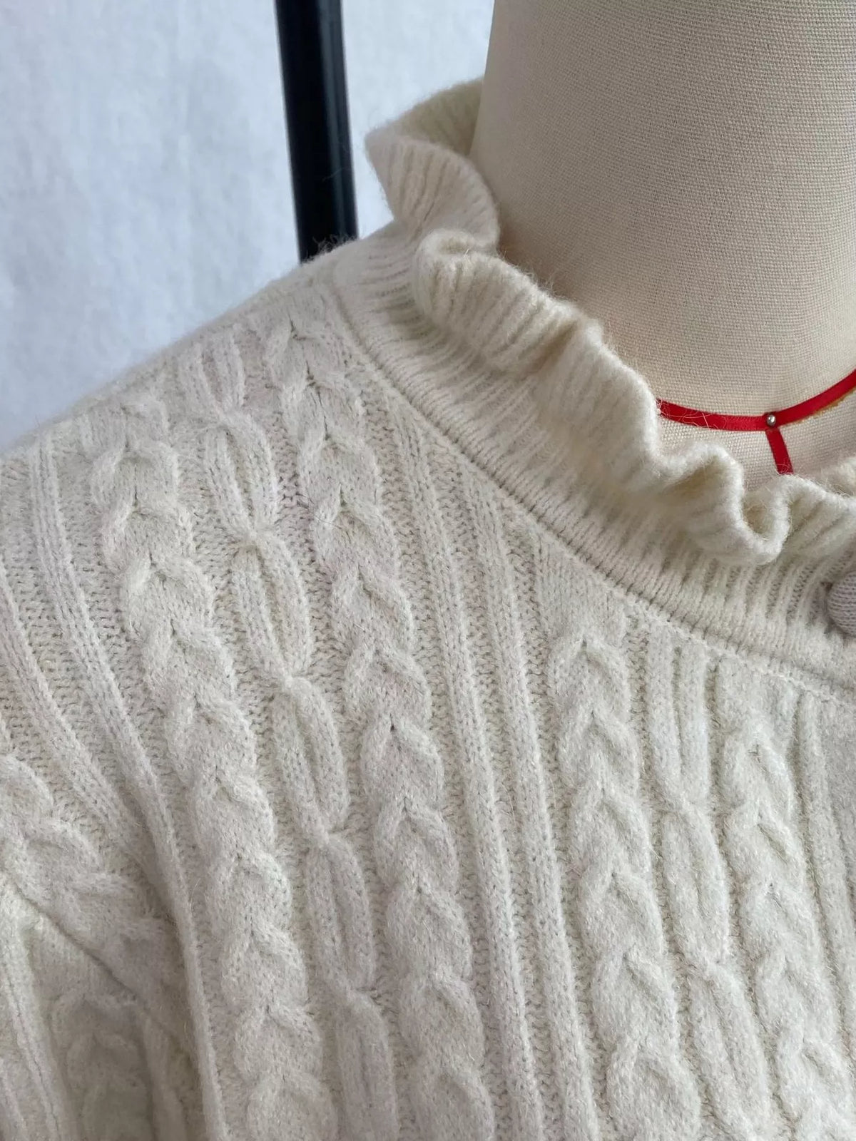 cable-knit ruffle-trim cardigan | dropsona - neutral - usage example