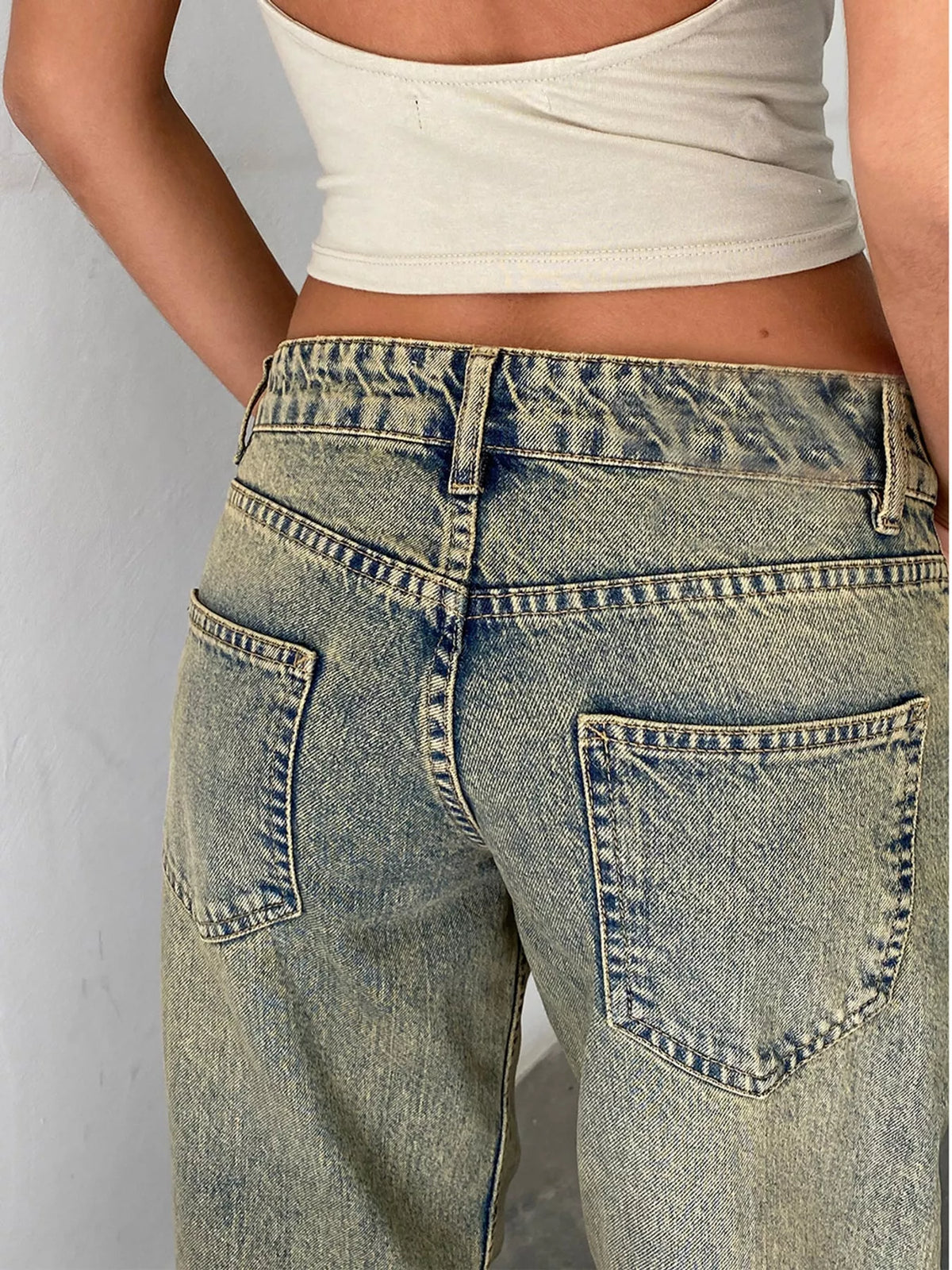 vintage wash low-rise wide-leg jeans | dropsona - neutral - close-up detail