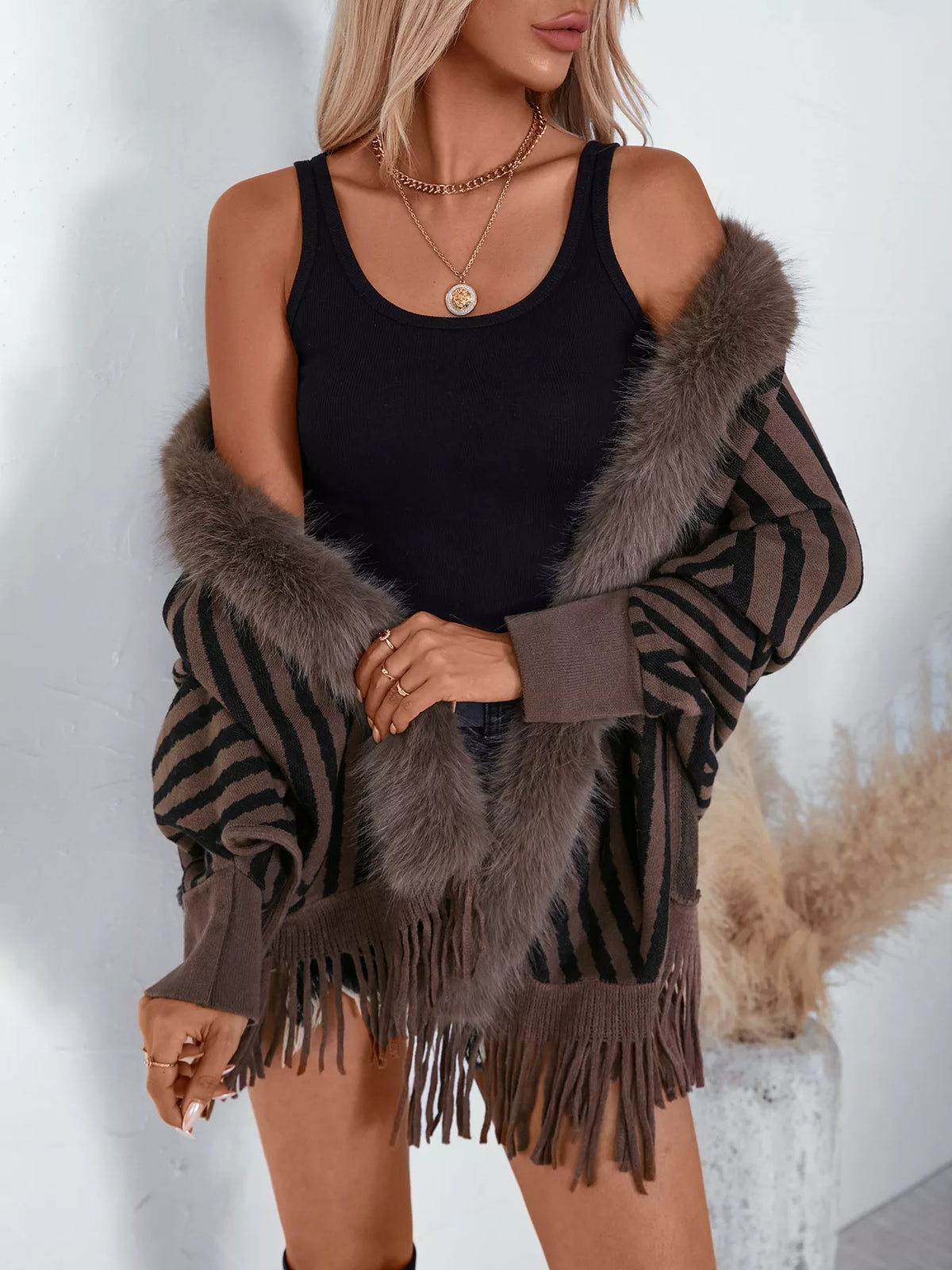 faux fur trimmed striped knit fringe poncho – | dropsona - neutral - close-up detail