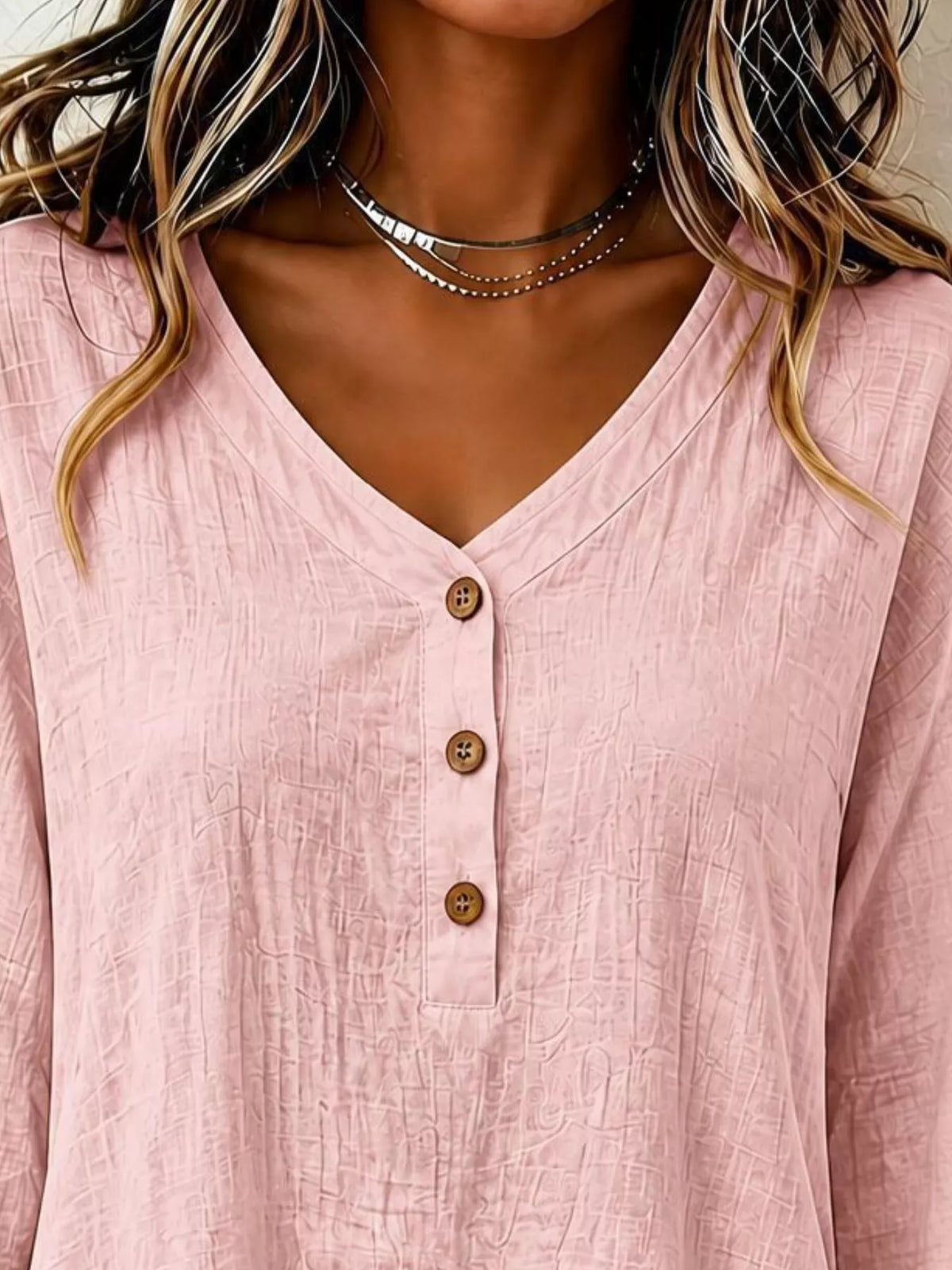 v-neck long sleeve button detail ruffled hem blouse | dropsona - neutral - front view