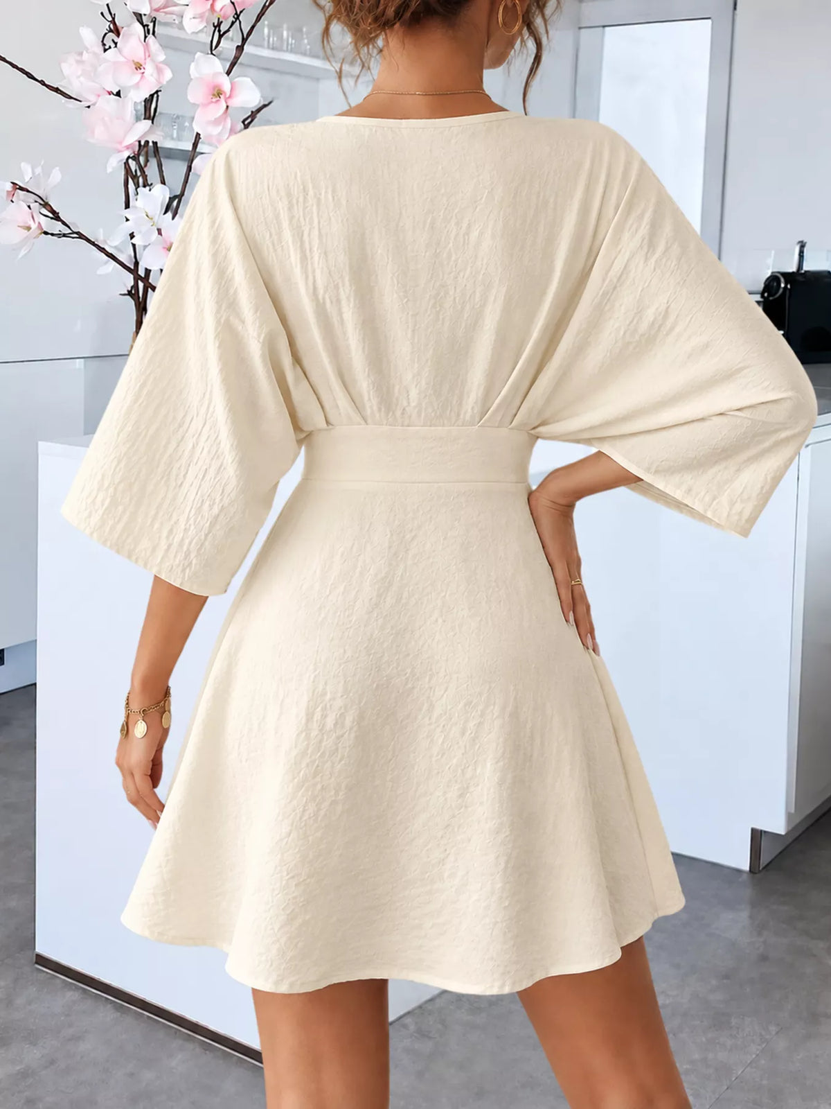 v-neck textured mini dress – basic style | dropsona - neutral - front view