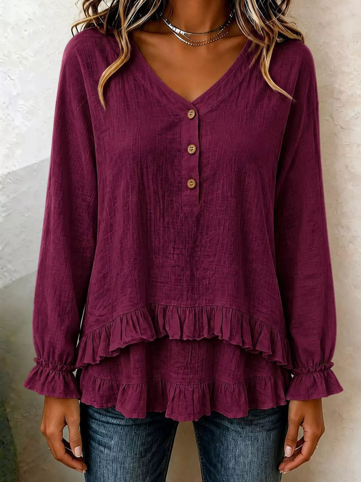 v-neck long sleeve button detail ruffled hem blouse | dropsona - neutral - material texture