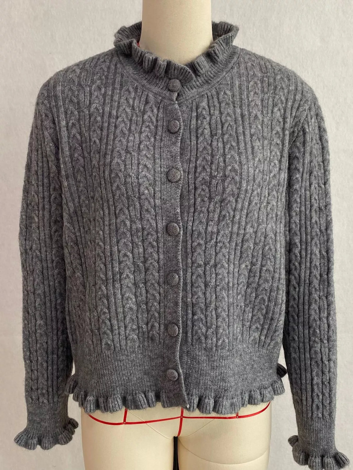 cable-knit ruffle-trim cardigan | dropsona - neutral - usage example