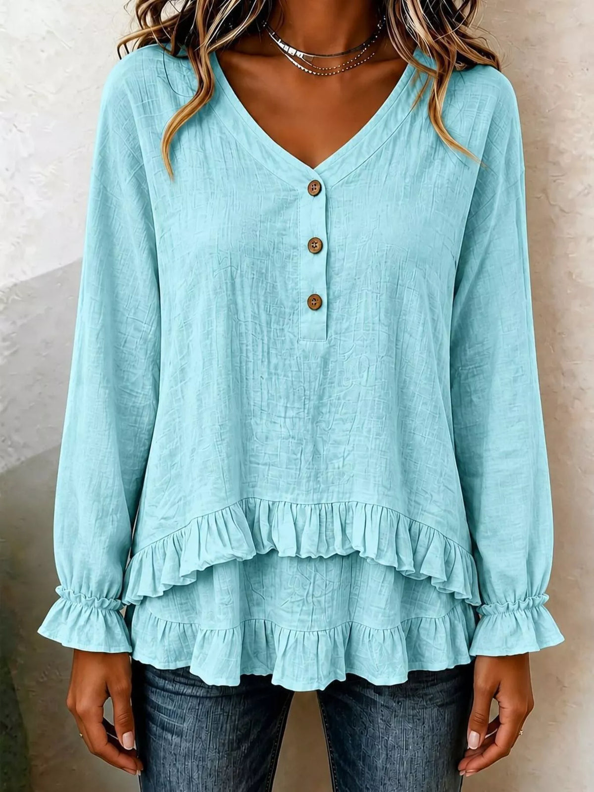 v-neck long sleeve button detail ruffled hem blouse | dropsona - neutral - material texture