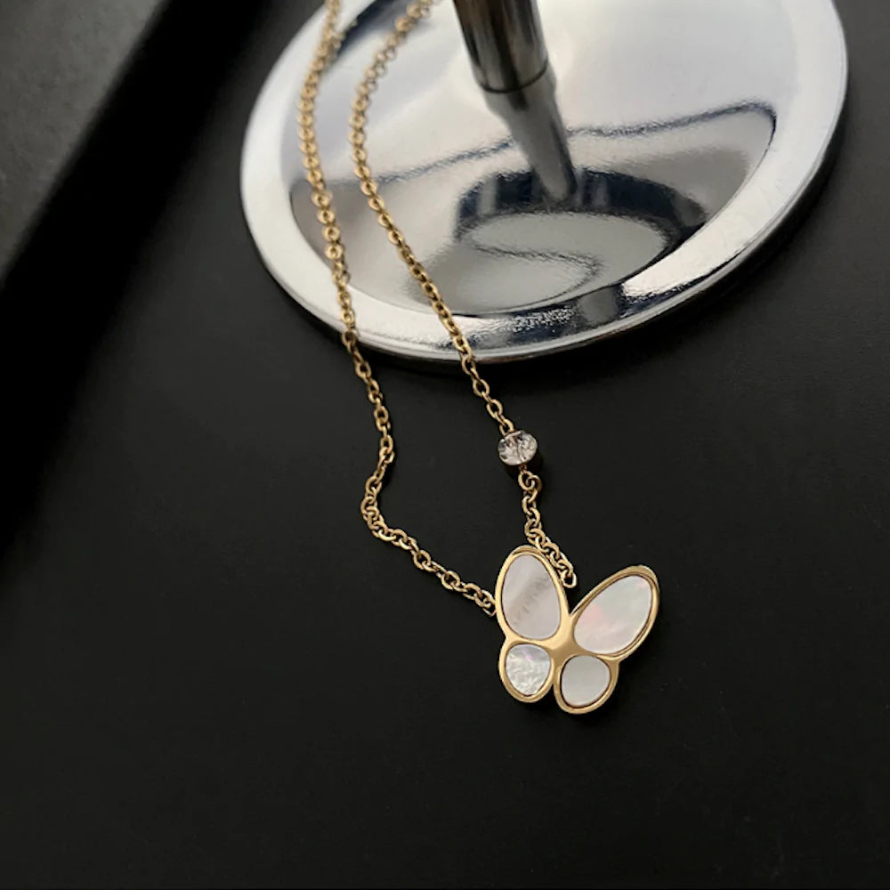 womens necklace with butterfly pedant – this ne | dropsona - neutral - front view