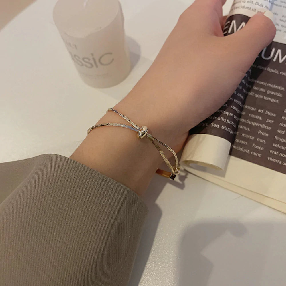 womens knot style bracelet with a bar – the length of | dropsona - neutral - size reference