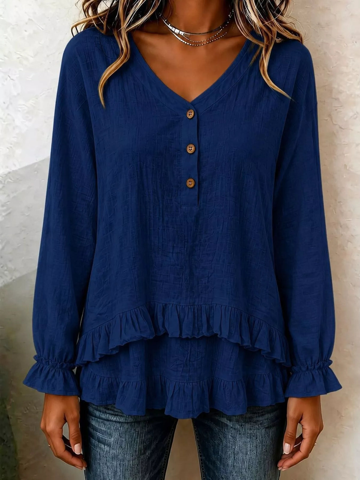 v-neck long sleeve button detail ruffled hem blouse | dropsona - neutral - material texture