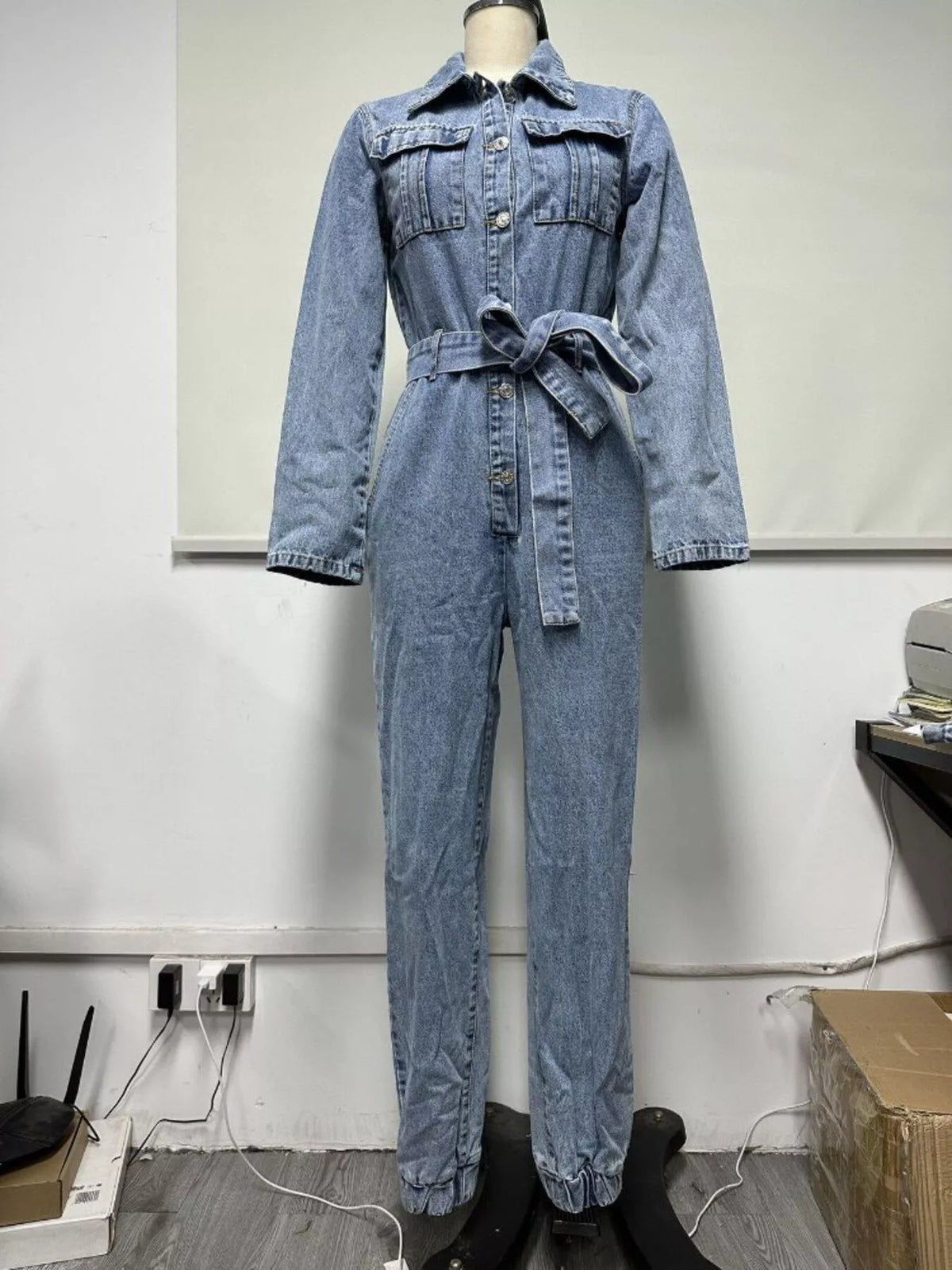 long sleeve button-up denim jumpsuit with belted | dropsona - neutral - material texture