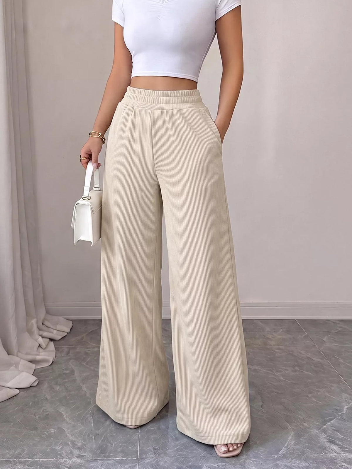 high-waisted wide-leg casual pants with elastic | dropsona - neutral - front view