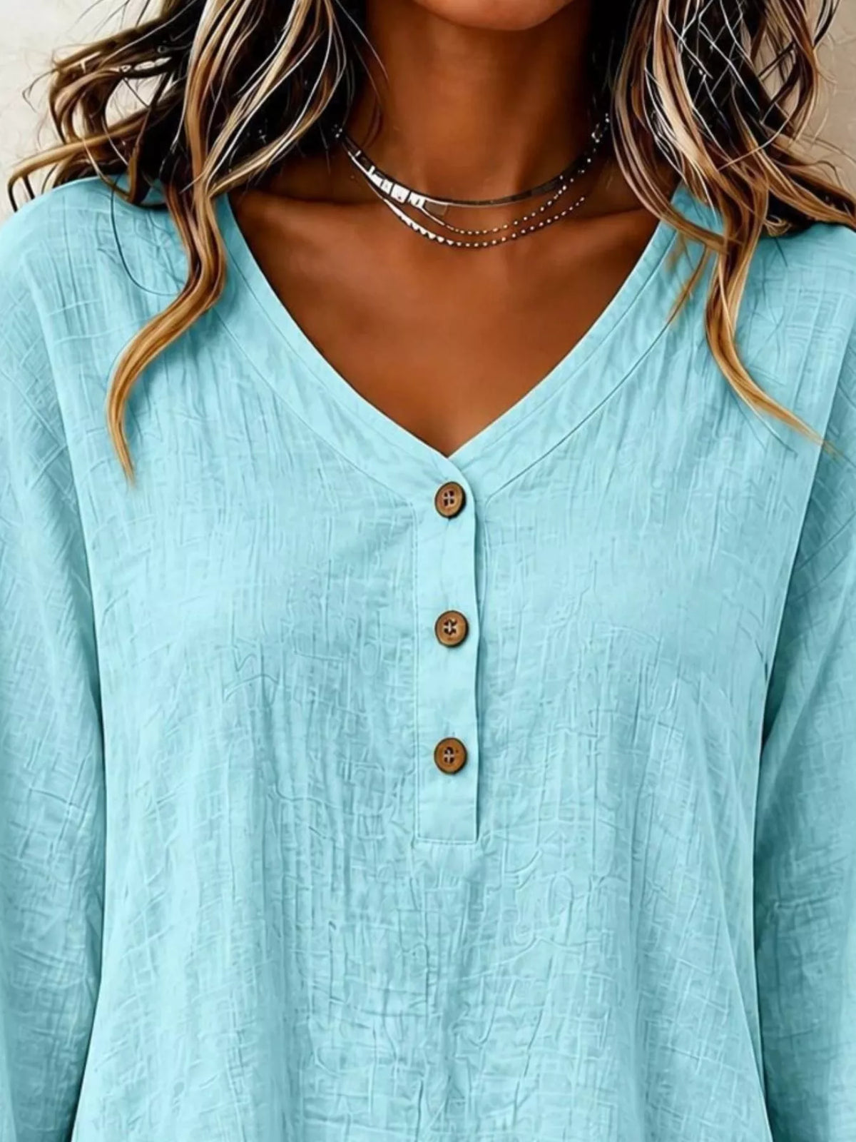 v-neck long sleeve button detail ruffled hem blouse | dropsona - neutral - size reference