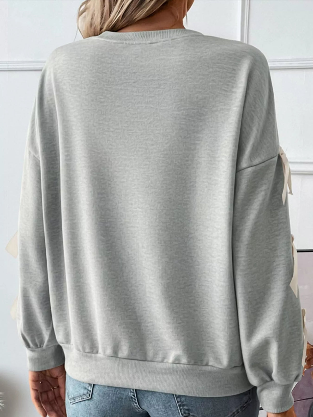 crew neck sweatshirt with decorative bow | dropsona - neutral - usage example